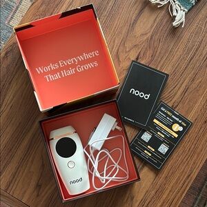 Nood Hair Removal Device in White and Black